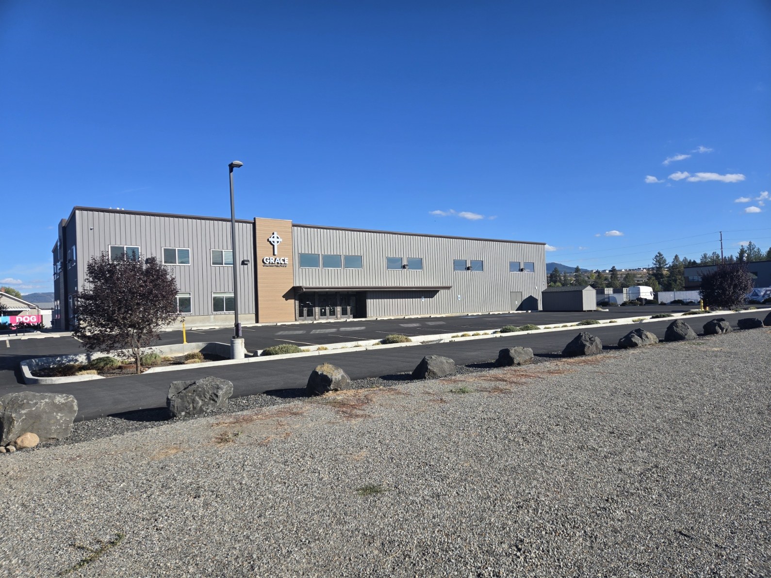 Sprague building at Appleway Business Park, with paved parking and landscaped frontage